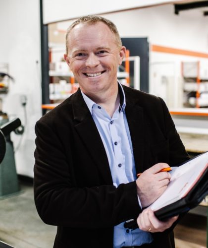 local-business-man-in-conversation-a-businessman-holding-a-book-trying-to-sell-his-products-brochure_t20_looga2.jpeg