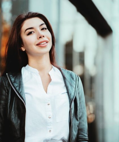 portrait-of-young-happy-business-woman-near-office-building-beautiful-caucasian-student-girl-in-white_t20_BlPVPj.jpeg